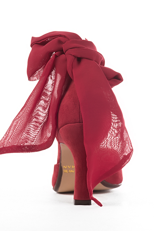 Cardinal red women's open side shoes, with a scarf around the ankle. Square toe. Very high spool heels. Worn view - Florence KOOIJMAN